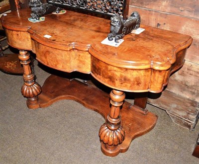 Lot 410 - A Victorian walnut Duchess dressing table base (lacking back)