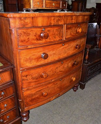 Lot 421 - A Victorian mahogany bow front chest