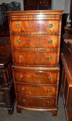 Lot 423 - A reproduction mahogany chest on chest of six drawers