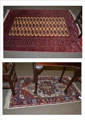 Lot 444 - A Persian design rug with central beige medallion and a modern Bokhara rug (2)