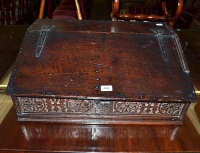 Lot 446 - An early 18th century oak bible box with carved frieze with initials E. F.