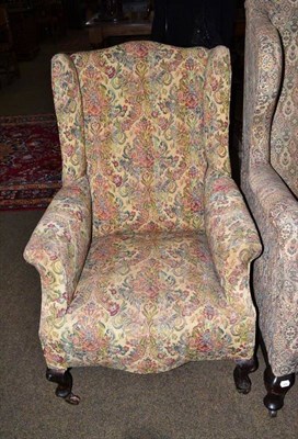 Lot 459 - Floral upholstered wing armchair