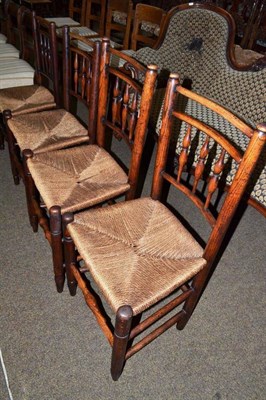 Lot 465 - Four rush seated chairs