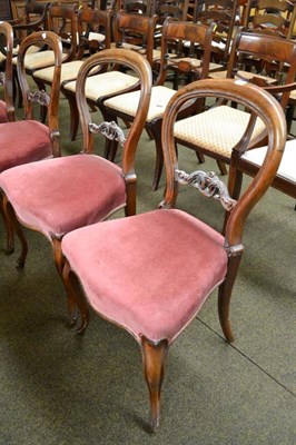 Lot 476 - A set of six Victorian walnut balloon back salon chairs