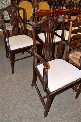 Lot 479 - A pair of Hepplewhite style mahogany elbow chairs