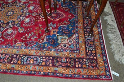 Lot 492 - Tabriz rug, the claret floral field with a pole medallion framed by spandrels and indigo...