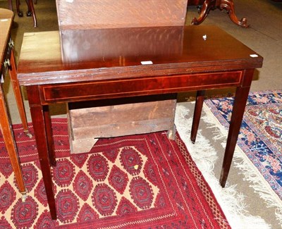 Lot 494 - 19th century mahogany fold-over tea table