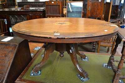 Lot 514 - A Victorian walnut tip top table