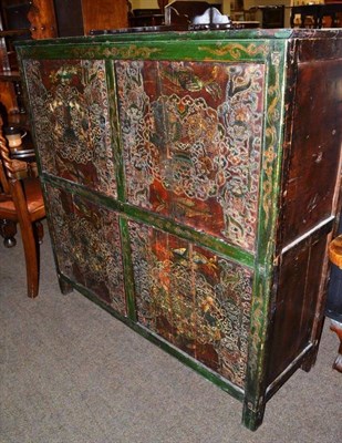 Lot 527 - Antique polychrome-decorated four door cabinet