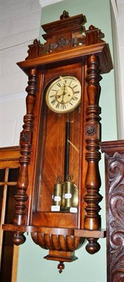 Lot 530 - A double weight driven Vienna type wall clock, with two weights and pendulum