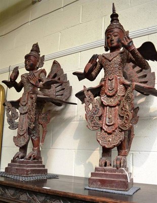 Lot 532 - Two Burmese wood statues (one with hat finial chipped)