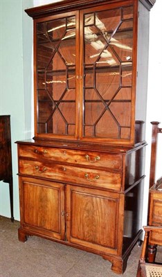 Lot 543 - George III mahogany secretaire bookcase