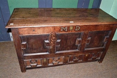 Lot 545 - Oak dower chest with geometric drawers