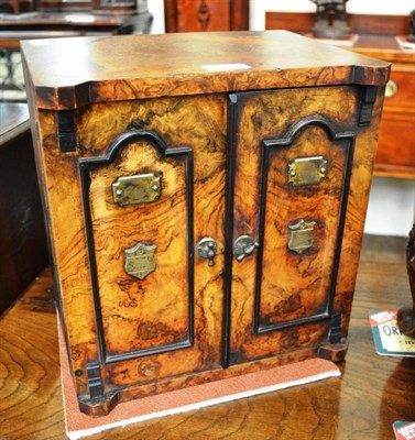 Lot 549 - A late 19th century/early 20th century walnut smoker's cabinet with stamped registration no. 231621