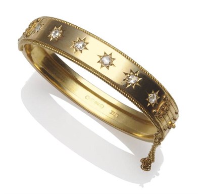 Lot 407 - A Victorian 15 Carat Gold Diamond Bangle, six graduated rose cut diamonds inset to the upper...