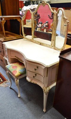 Lot 640 - A cream and gilt painted dressing table with triple mirror and dressing stool