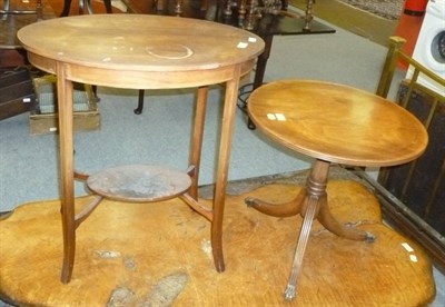 Lot 655 - An oval occasional table and a circular occasional table