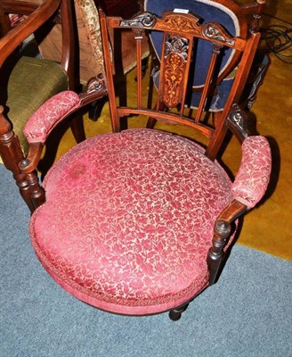 Lot 679 - A Edwardian inlaid rosewood elbow chair