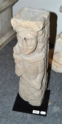 Lot 690 - An English 16th century carved stone figural chimney piece jamb