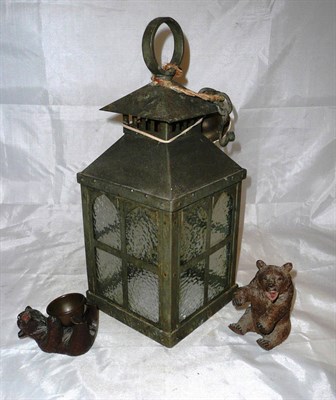 Lot 1 - An Arts and Crafts hall lantern, two Black Forest carved bears and a plated oval two handled...