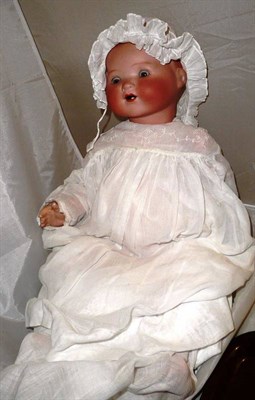 Lot 13 - Armand Marseille baby doll in white cotton gown and bonnet