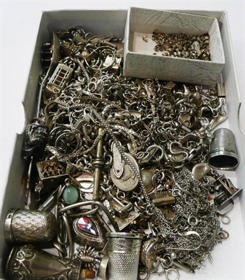 Lot 63 - Assorted silver charms, loose silver, chains etc