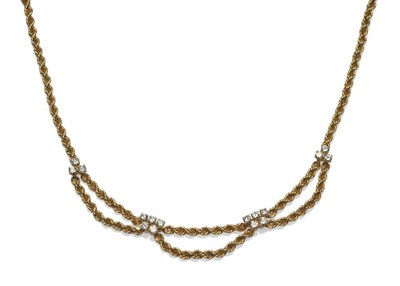 Lot 428 - An 18 Carat Gold Rope Twist and Diamond Necklace, signed Boucheron, the necklace with three...