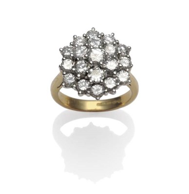 Lot 429 - An 18 Carat Gold Diamond Cluster Ring, three tiers of round brilliant cut diamonds in white...