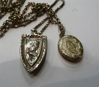 Lot 108 - A locket on belcher chain and a Victorian silver shield locket on chain