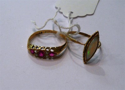 Lot 109 - An 18ct gold ring and an opal ring