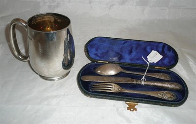 Lot 123 - Silver tankard and Christening set