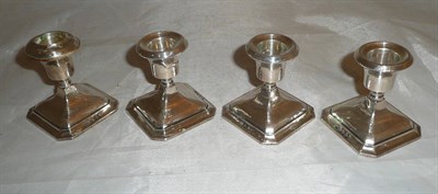 Lot 124 - Four loaded dwarf candlesticks