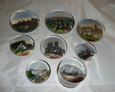 Lot 132 - Eight glass printed paperweights