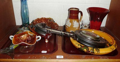 Lot 149 - A shelf of studio glass, aneroid barometer etc