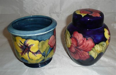 Lot 182 - Walter Moorcroft hibiscus planter and ginger jar and cover (2)