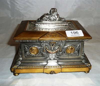 Lot 196 - Brass and white metal casket with lion surmount