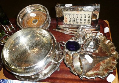 Lot 210 - Silver mounted desk calendar, plated wine funnel, two plated coasters, cruet set, hammered two...