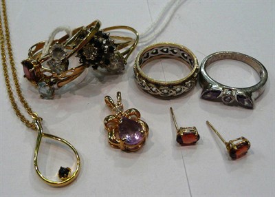 Lot 234 - A garnet set ring with matching earrings and pendant, assorted 9ct gold rings, costume...