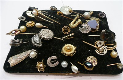 Lot 238 - A quantity of assorted gold, silver and decorative stick pins