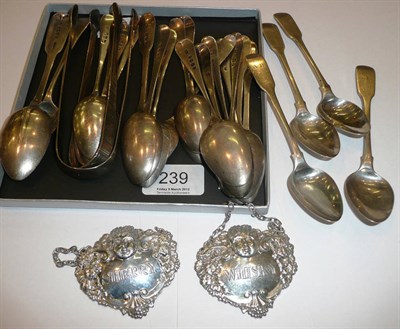 Lot 239 - Assorted Georgian silver teaspoons, two pairs of silver sugar nips, two silver spirit labels...