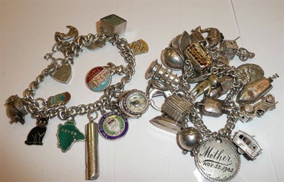 Lot 244 - Two silver charm bracelets with a quantity of assorted charms