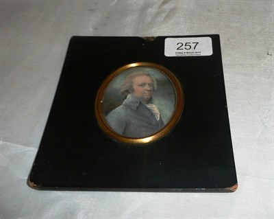 Lot 257 - A 19th century portrait miniature of a gentleman