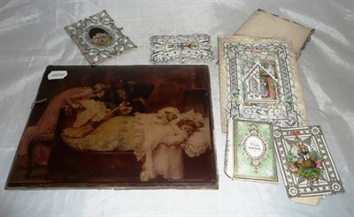 Lot 267 - A collection of cut and embossed paper greetings cards and an unframed crystoleum