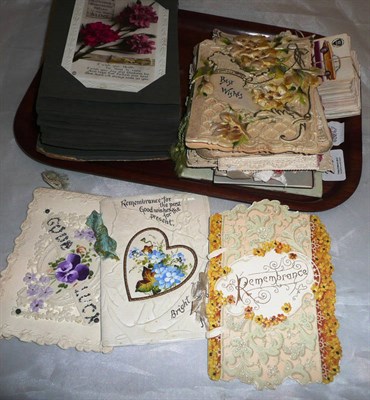 Lot 269 - A postcard album, Victorian cards and cigarette cards