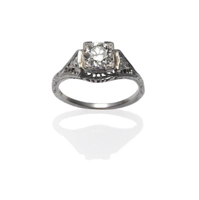 Lot 452 - An Art Deco Style Diamond Solitaire Ring, the round brilliant cut diamond in a white squared...