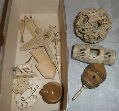 Lot 332 - Carved ivory puzzle, stereoscopic viewer, bodkin holder modelled as an umbrella, carved figures etc