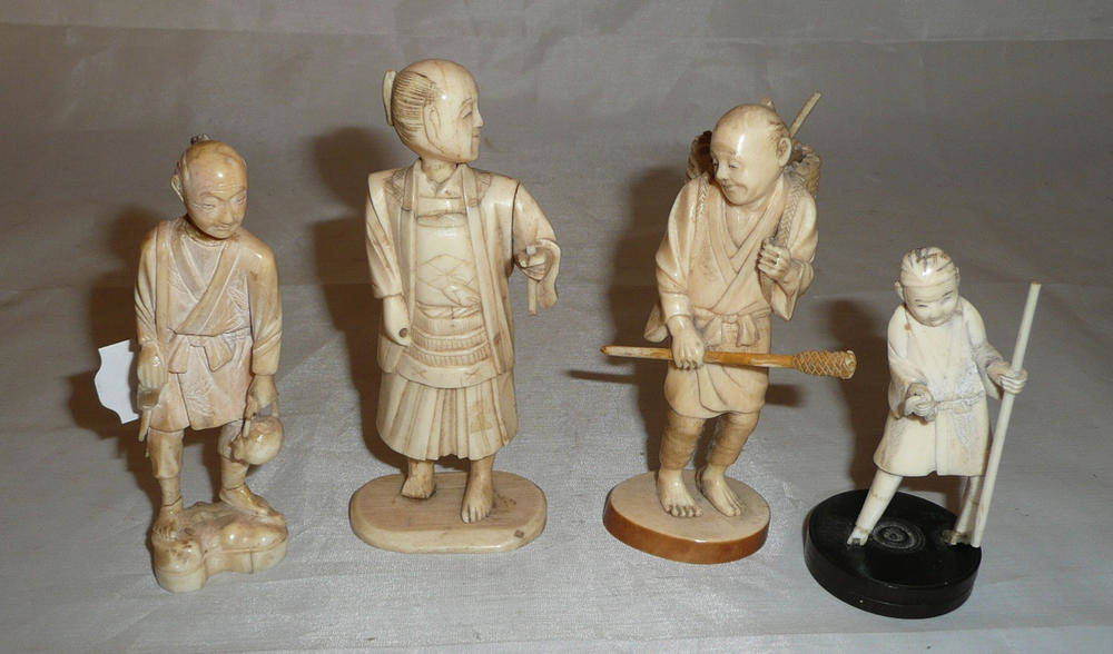 Lot 333 - Four assorted carved ivory and bone figures