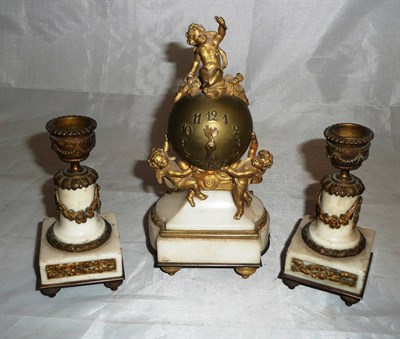 Lot 353 - Three piece gilt clock set