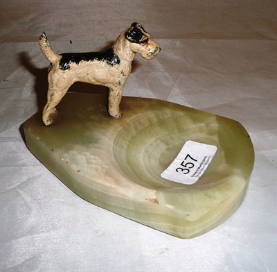 Lot 357 - A gold painted onyx ashtray