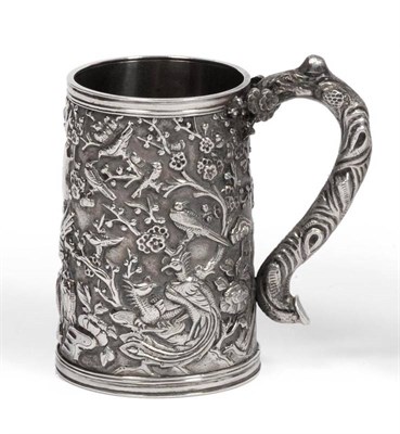 Lot 459 - A Chinese Export Mug, bears silver maker's marks WL, the slightly tapering double walled body...